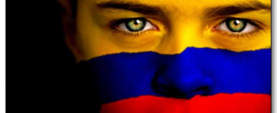 Foto: Bandera Colombiana pintada sobre el rostro de un niño.© Duncan Walker/Istockphoto